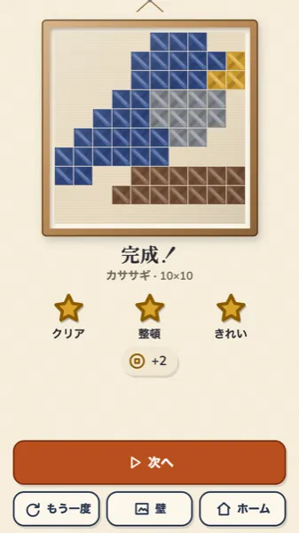 完成して額縁に入ったカササギの刺しゅう